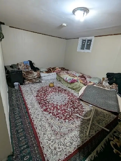 Large basement room in Heron Gate Mall. with bathroom. ASAP