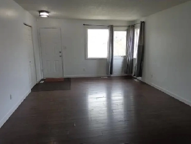 Open, bright 3-bedroom main-floor suite includes utilities