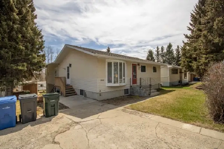 Bungalow for sale with Green space along the Red Deer River