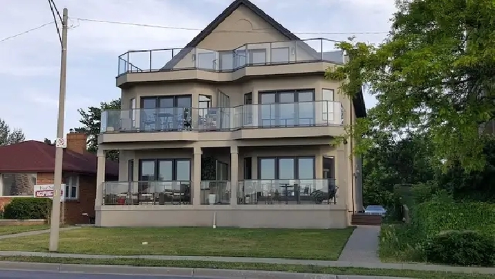 Take In Sunrise/Sunsets Along Waterfront from Private Balcony