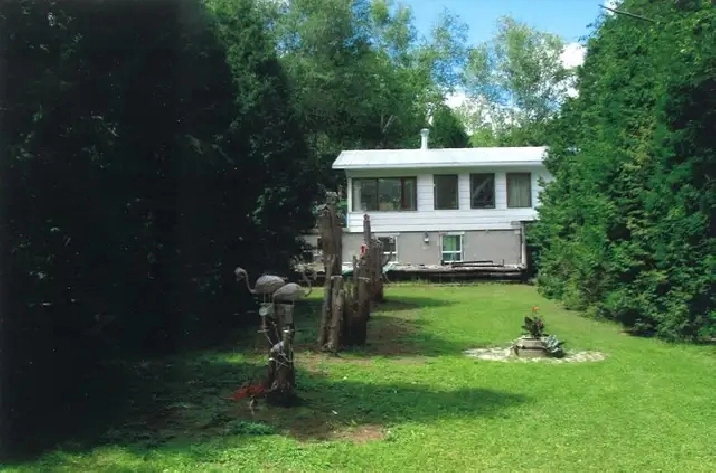 Maison bord de l'eau a Dolbeau, Lac St-Jean, 418-671-0353