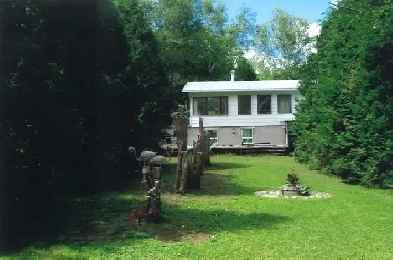 Maison bord de l'eau a Dolbeau, Lac St-Jean, 418-671-0353