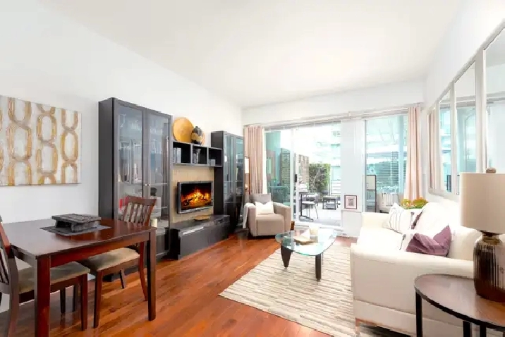 FURNISHED  EXECUTIVE 1BR DEN w GARDEN PATIO in PRIME LOCATION