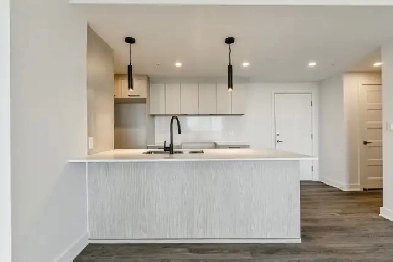 Magnifique Condo neuf 2 cac et balcon avec vue! Garage!