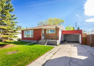 Beautifully remodelled 4bdrm bungalow tucked away on a quiet st!