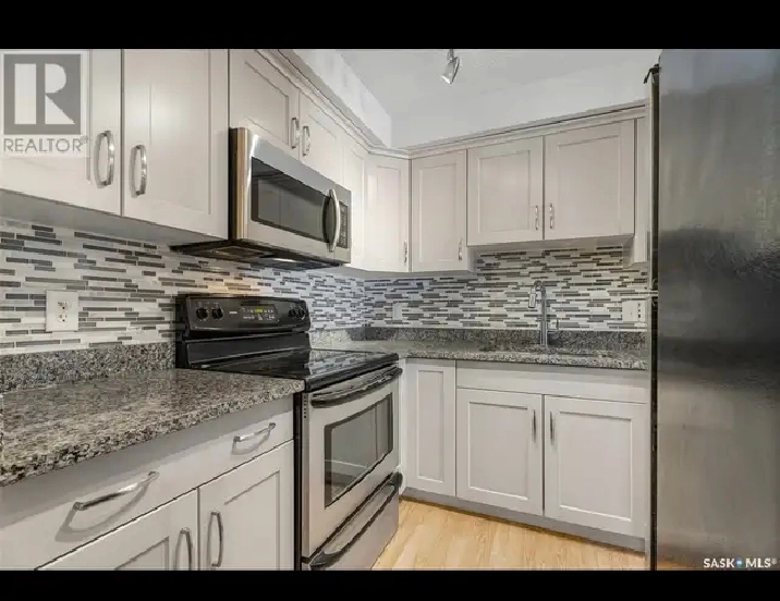 $1400.00 Mckercher/8th renovated one bedroom, in suite laundry