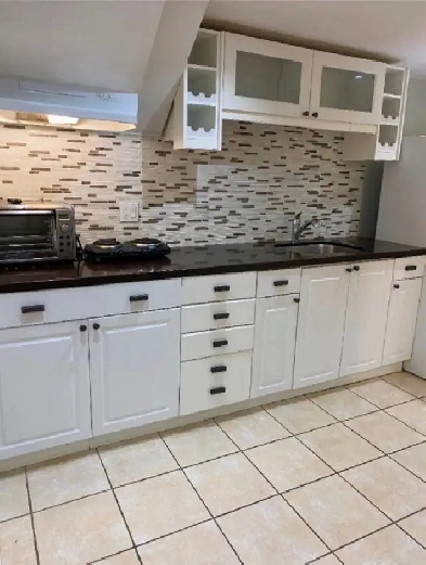 Furnished  1 bedroom basement near SQ 1 is short term rent