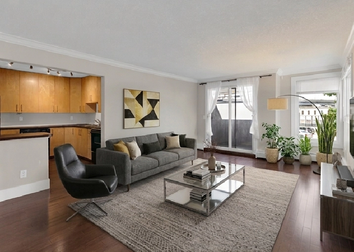 MODERN 2 BED SUNALTA CONDO WITH IN-SUITE LAUNDRY & PARKING