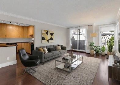 MODERN 2 BED SUNALTA CONDO WITH IN-SUITE LAUNDRY & PARKING