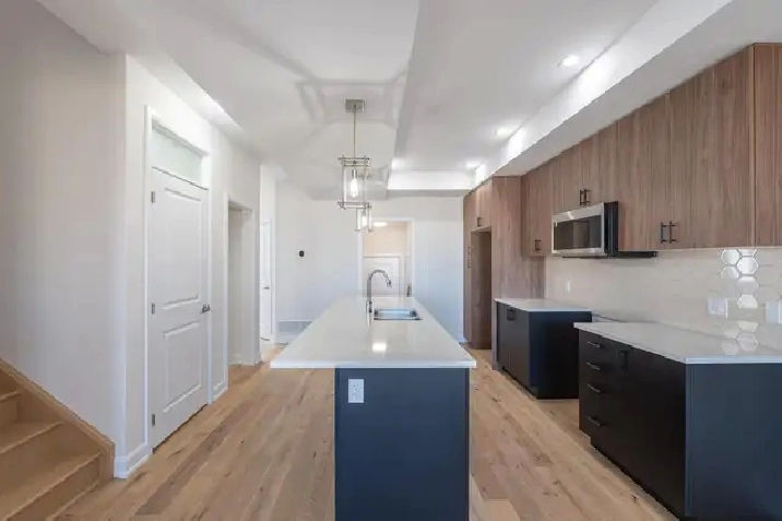 Luxury 4 bedroom upper unit with master balcony & double garage