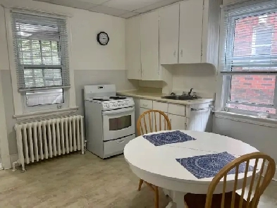 Bright Fully Furnished Bachelor Apt with Sun Porch
