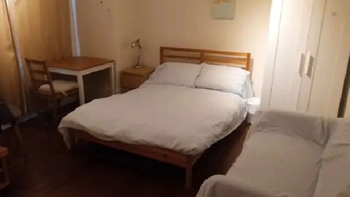 Large furnished room downtown available July 1 - female only