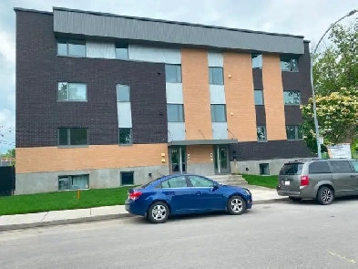 Grand 4 ½ style condo avec Bureau –Stationnement