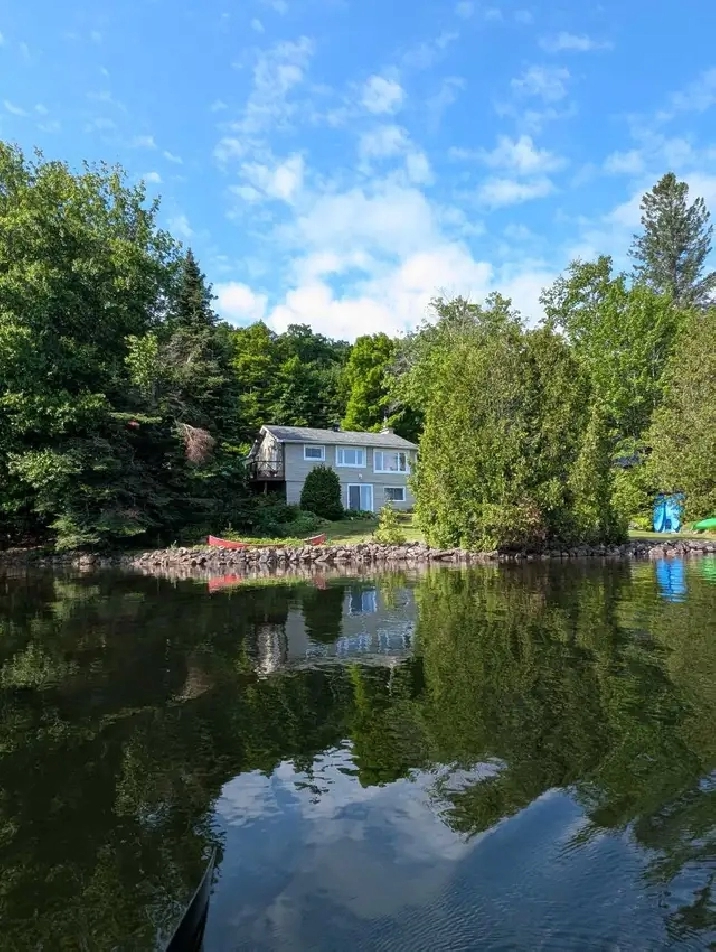 Upper island lake waterfront home