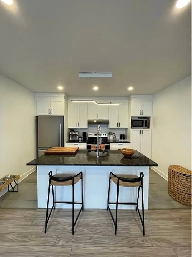 GRAND LOGEMENT 6 1/2 À LOUER