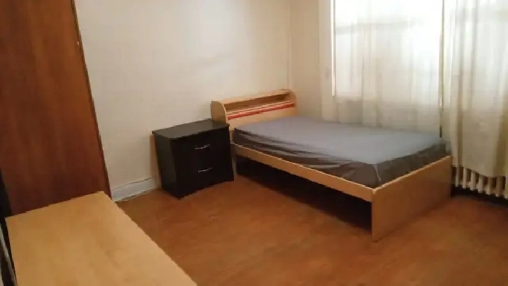Extra Large Furnished room with utilities & Wifi on Main Floor