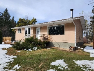 Peaceful Acreage with Heated Shop, Garage & Horse Barn