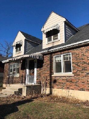 1 bedroom on main level, large backyard, parking and laundry