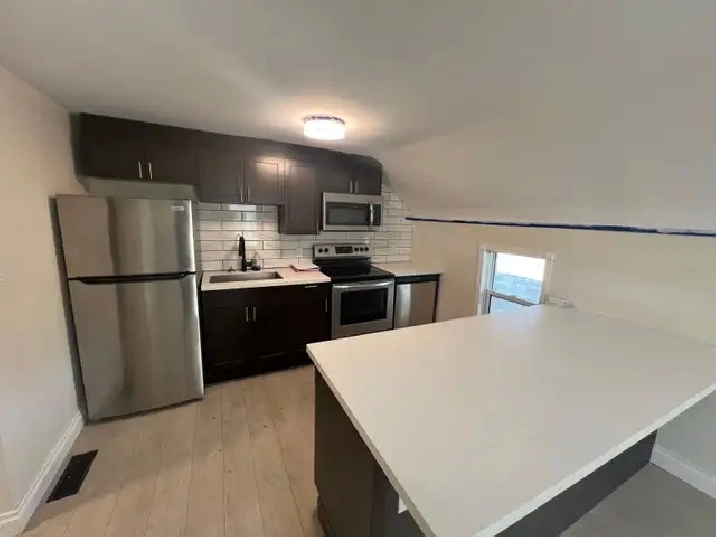1 Bed   Den, 1 Bath, with 1 Car Parking