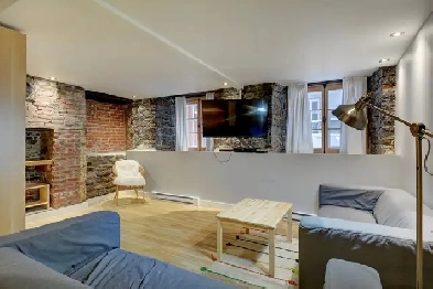 Loft entièrement meublé à louer Vieux-Québec juillet 2026