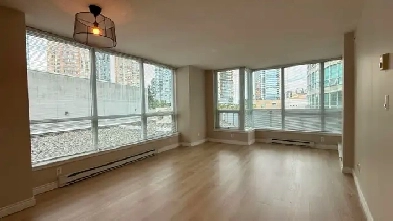 Fresh Paint & New Floor! 2-Bedroom Condo Unit above Crystal Mall