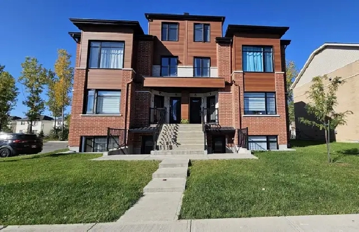 4 1/2 à Laval Ste-Rose - style condo - immeuble récent
