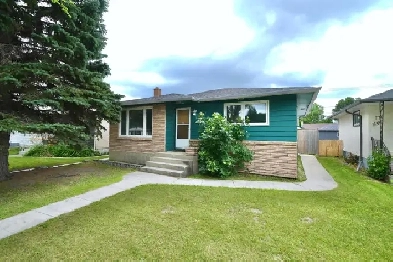 3 BEDROOM/2 BATHROOM BUNGALOW WITH A FULL BASEMENT AND GARAGE