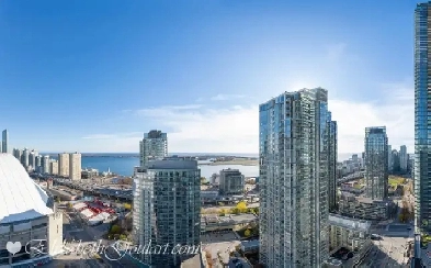 81 NAVY WHARF COURT - OPTIMA CONDOS - 2 BEDROOM DEN W/1-PARKING
