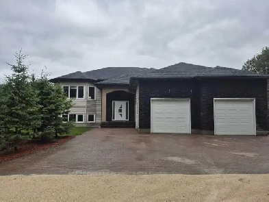 Stunning Custom-Built Built Home With Private Yard