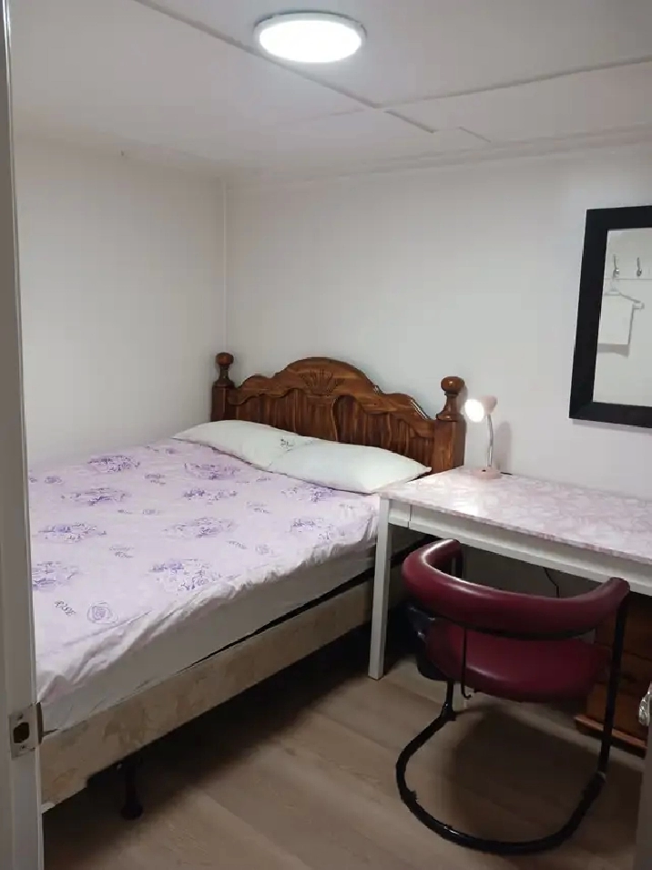A brand new private day room with a queen-size bed