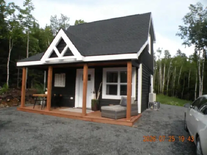CHARMING NEW HOME WITH LAKE ACCESS & PRIVACY