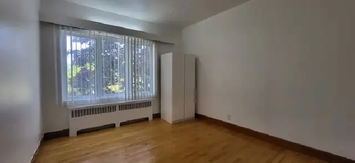 Dans colocation de 3 chambres au 2ième étage près Université