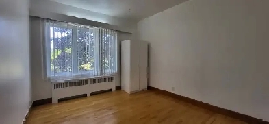 Dans colocation de 3 chambres au 2ième étage près Université