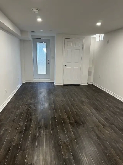 NEW 3-Bdr Legal Basement Apt — Private Entry, Parking, & Laundry