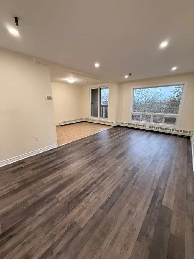 Spacious 2-Level 2BR w/ Private Deck - Heat/Water/PK Incl