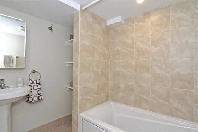 Junction-area gem with utilities   ensuite laundry included!