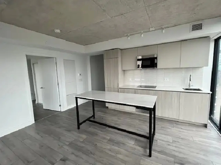 master room in a new condo near TMU for long term to rent in Sep
