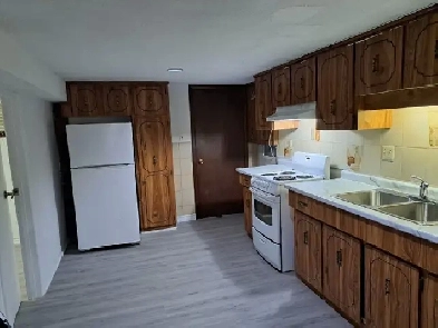 Monthly Rent $1,850:.2 Bed rooms 1 bath room at House Basement