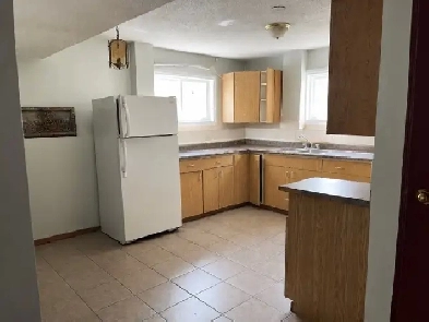 Spacious 2-Bedroom Basement Suite for Rent – Shared Laundry
