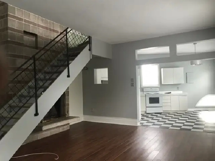 2 LEVEL 1.5 br apt. Very large with 20’ stone fireplace. locatio