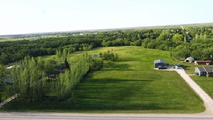 Rare chance to own a 3.6 acre riverfront lot in Lorette!