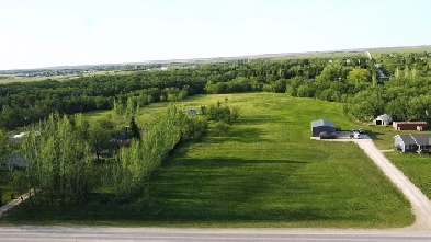 Rare chance to own a 3.6 acre riverfront lot in Lorette!