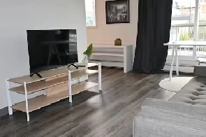 SOUTHSIDE- LARGE FURNISHED BACHELOR UNIT-3RD FLOOR-BALCONY