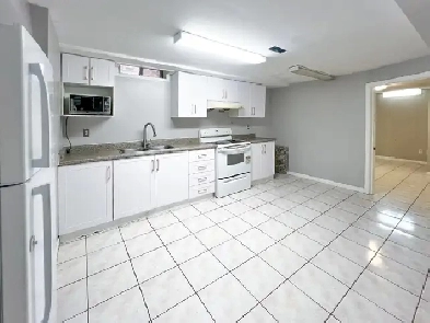 Spacious 2 Bed, 2 Bath Basement | Utilities & 2 Parking Included