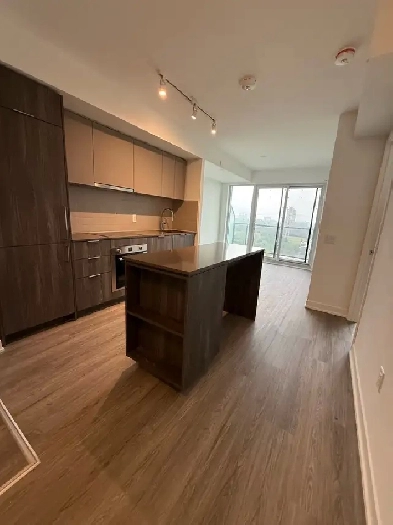 Brand new 1 bed den, 2 bath condo at Metro Park, North York
