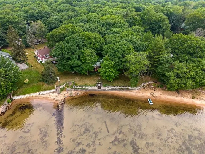 2storey home with 173ft sand bottom beach and additional cottage