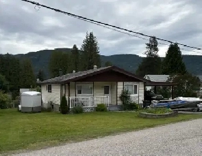Spacious 4 Bedroom Home with Walkout, Covered Deck & Large Lot