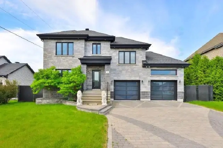 Maison à vendre à Blainville – 6 chambres – Garage double 1.1 M