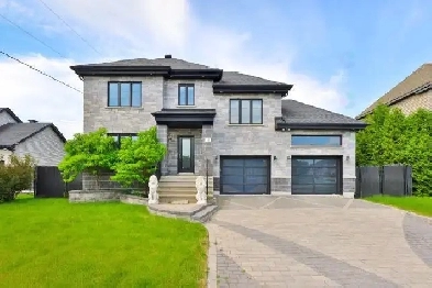 Maison à vendre à Blainville – 6 chambres – Garage double 1.1 M