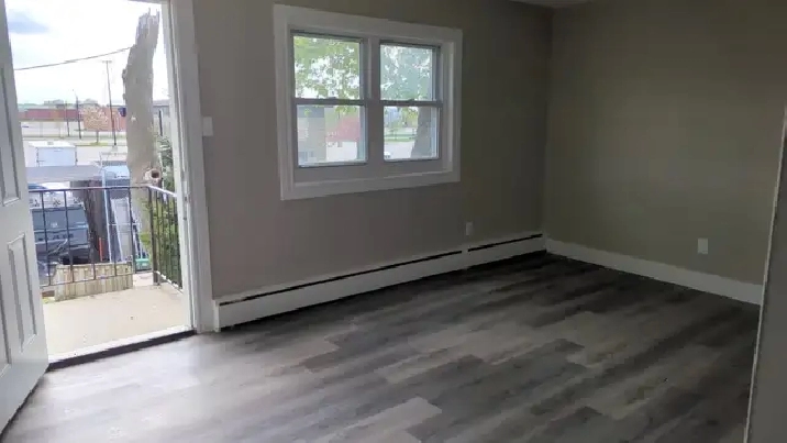 Modern 1 Bedroom Apartment Just Steps Away From Western Fair
